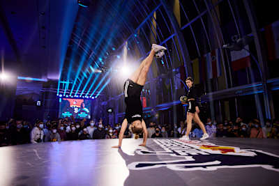 Aguska Mnich (POL) inverts in a battle against Lia Lewis (UK) during the Red Bull Street Style World Final at Valencia, Spain on November 20, 2021