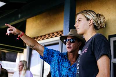 Glenn Hall and Molly Picklum talk tactics at the Hurley Pro Sunset Beach in Hawaii on February 19, 2023. 