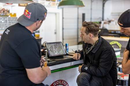 Mason Mashon and Dustin Snipes work with Luke Aikins to map out their plan