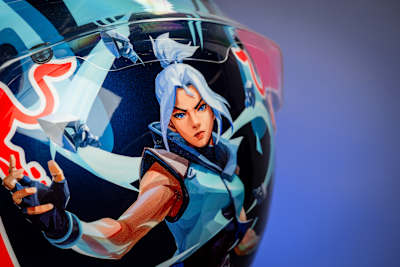 Yuki Tsunoda's new Valorant themed helmet design shot in Milton Keynes, United Kingdom on July 13, 2024 