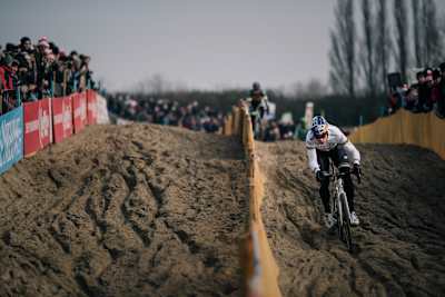 Cyclist Wout van Aert makes a break for it during a cyclocross race.