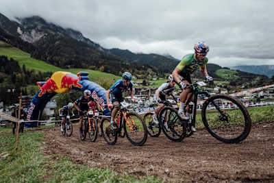 XCO athlete Henrique Avancini and a pack of cross-country riders as seen climbing at UCI XCO World Championships in Leogang, Austria on October 10, 2020