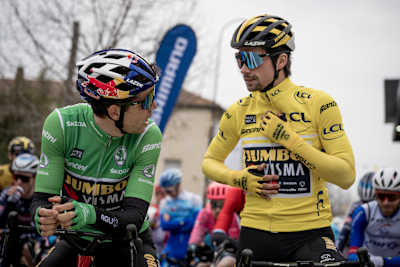 Green Jersey points leader Wout van Aert and teammate & race leader Primoz Roglic at the race start in Courthézon, France during the 80th Paris - Nice cycling race in France on March 11, 2022.