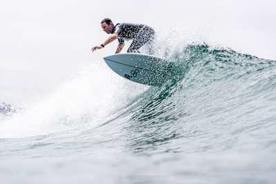 Brad Davis surfs at North Jetty in Oceanside, California