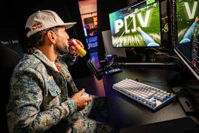 Freestyle footballer Sean Garnier plays EA Sports FC 26 at a launch event in London on September 17, 2025.