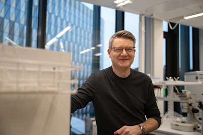 Christian Göritz posing in the laboratory at Karolinska Institutet in Stocholm Sweden where they conduct spinal cord injury research funded by the Wings For Life Foundation (January 2026)