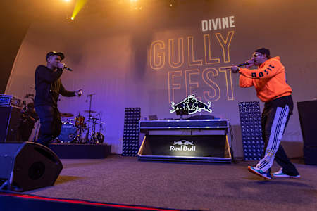 A photo of Mumbai rapper DIVINE rapper with Ranveer Singh at DIVINE X Gully Fest in Mumbai in 2018.