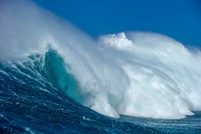 Justine Dupont surfing at Jaws.