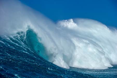 Justine Dupont surfing at Jaws.