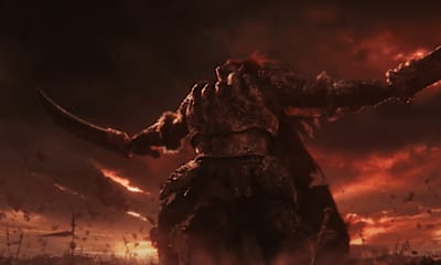 A giant warrior with two swords roars towards the sky in Elden Ring.