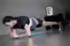 Ashling Thompson holds a plank.