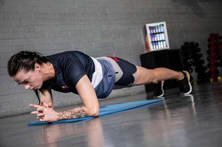 Ashling Thompson holds a plank.