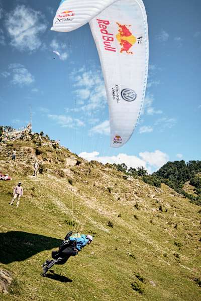 Thomas de Dorlodot and Horacio Llorens paraglide over the Himalayan mountains.