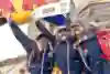 A Red Bull Can You Make It? team celebrates reaching the finish line in Berlin, Germany on May 28, 2024.
