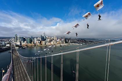Sean MacCormac skysurfs from 1,500m to ride the Bay Bridge in San Francisco, California, USA on August 23, 2025. 