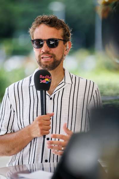 Red Bull TV commentator Sandy Farquharson speaks into the mic during the Premier Padel Tour's Italy Major event in Rome.