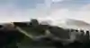 A screenshot of a course with a Red Bull finish gate in the drone racing video game DCL – The Game.