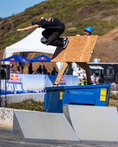Roman Pabich wall rides Man Ramp's ply wood at Red Bull Sky Line 2024 in San Francisco, California