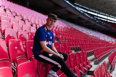 Donovan 'RBLZ_Tekkz' Hunt sits in the stands at the Red Bull Arena.