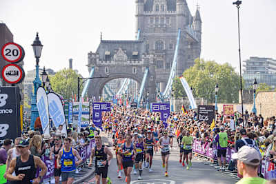 Thousands of runners pass across Tower Bridge during the London Marathon 2025.