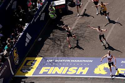 Runners make their way down Boylston Street during the 129th Boston Marathon on April 21, 2025 in Boston, Massachusetts. 