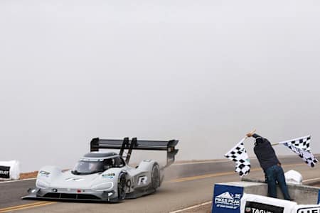 Romain Dumas crosses the line a the 2018 Pikes Peak International Hill Climb and records the first ever sub-eight unite run.