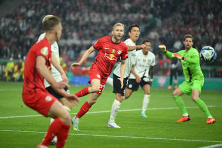 Konrad Laimer of RB Leipzig looks after the ball during the DFB Cup final match between RB Leipzig and Eintracht Frankfurt at Olympiastadion on June 03, 2023 in Berlin, Germany.