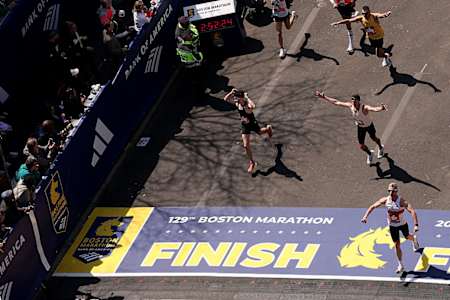 Runners make their way down Boylston Street during the 129th Boston Marathon on April 21, 2025 in Boston, Massachusetts. 