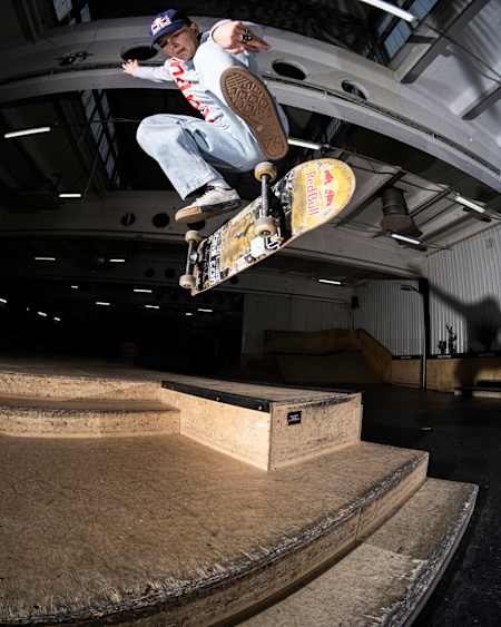 Zuzanna Bone does a heelflip at Warsaw, Poland 