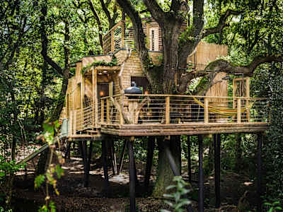 This hideaway includes a revolving woodburner, open-air shower and a slide