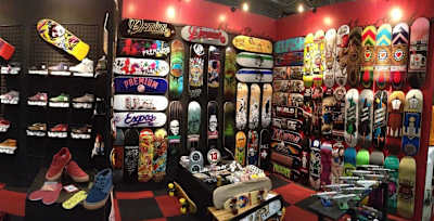 A photo of the interior of a skateboard shop.