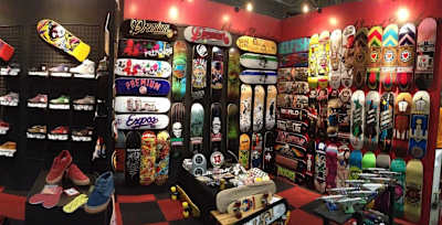 A photo of the interior of a skateboard shop.