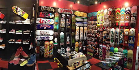 A photo of the interior of a skateboard shop.