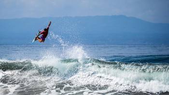 Professional surfer from Australia Ozzie Wright tweaks a backside method air in Bali, Indonesia.