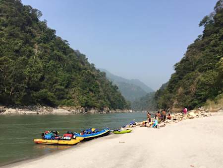 A group of adventure seekers get ready to raft the Sun Koshi River in Nepal