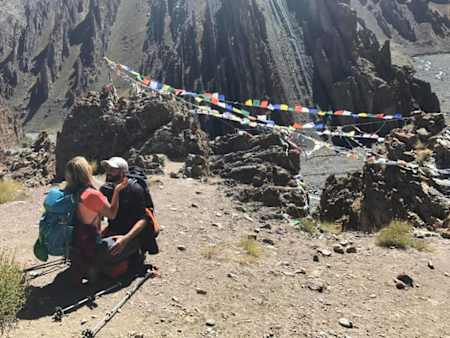 Natalie Oliver-Ironmonger and fiancée embrace on Stok Kangri