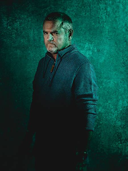 Joe Simpson poses for his portrait.