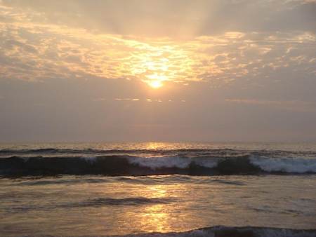 Waves at sunset in Montañita, on the Santa Elena peninsula.