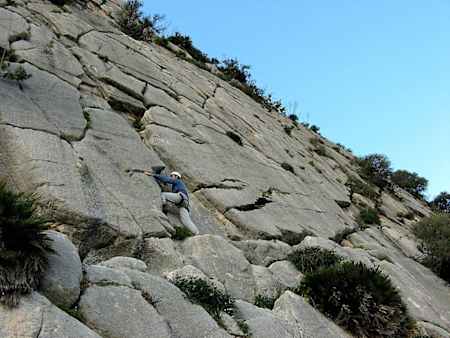 A man climbs the El Chorro rock climb near Valle de Abdalajis in Malaga, Spain.