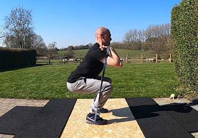 Banded front squat bodyweight exercise