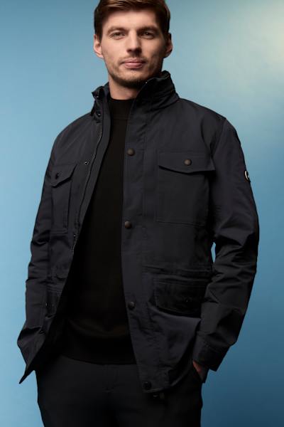 Max Verstappen wearing all black: The Dutch F1 champion has become a brand ambassador for AlphaTauri, a premium fashion brand he has worn for years. 
