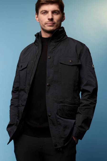 Max Verstappen wearing all black: The Dutch F1 champion has become a brand ambassador for AlphaTauri, a premium fashion brand he has worn for years. 