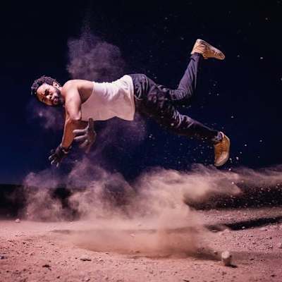 Twixx is breaking outdoors with dust flying around