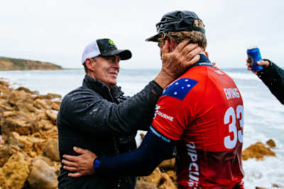 Ethan Ewing celebrates winning Bells with his father, Bill