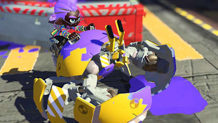 Sreenshot zeigt einen Charakter aus Splatoon 3 in einer bunten Maschine.