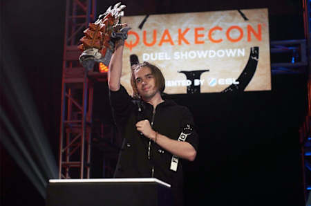 A photo of Quake player Clawz celebrating victory at QuakeCon.