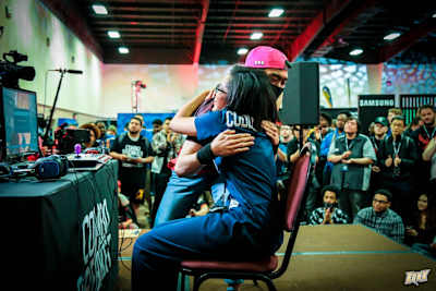 Tekken pro player Cuddle Core with fellow player Chanel at Combo Breaker tournament.