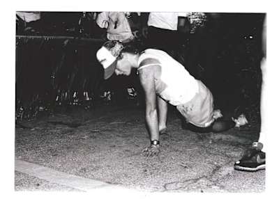 Julie Moss pulls herself over the finish line during 1982 IRONMAN.