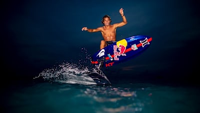 Image of pro surfer Kai Lenny in action.