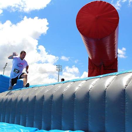 A participant takes part in the Ridiculous Obstacle Challenge in Australia.